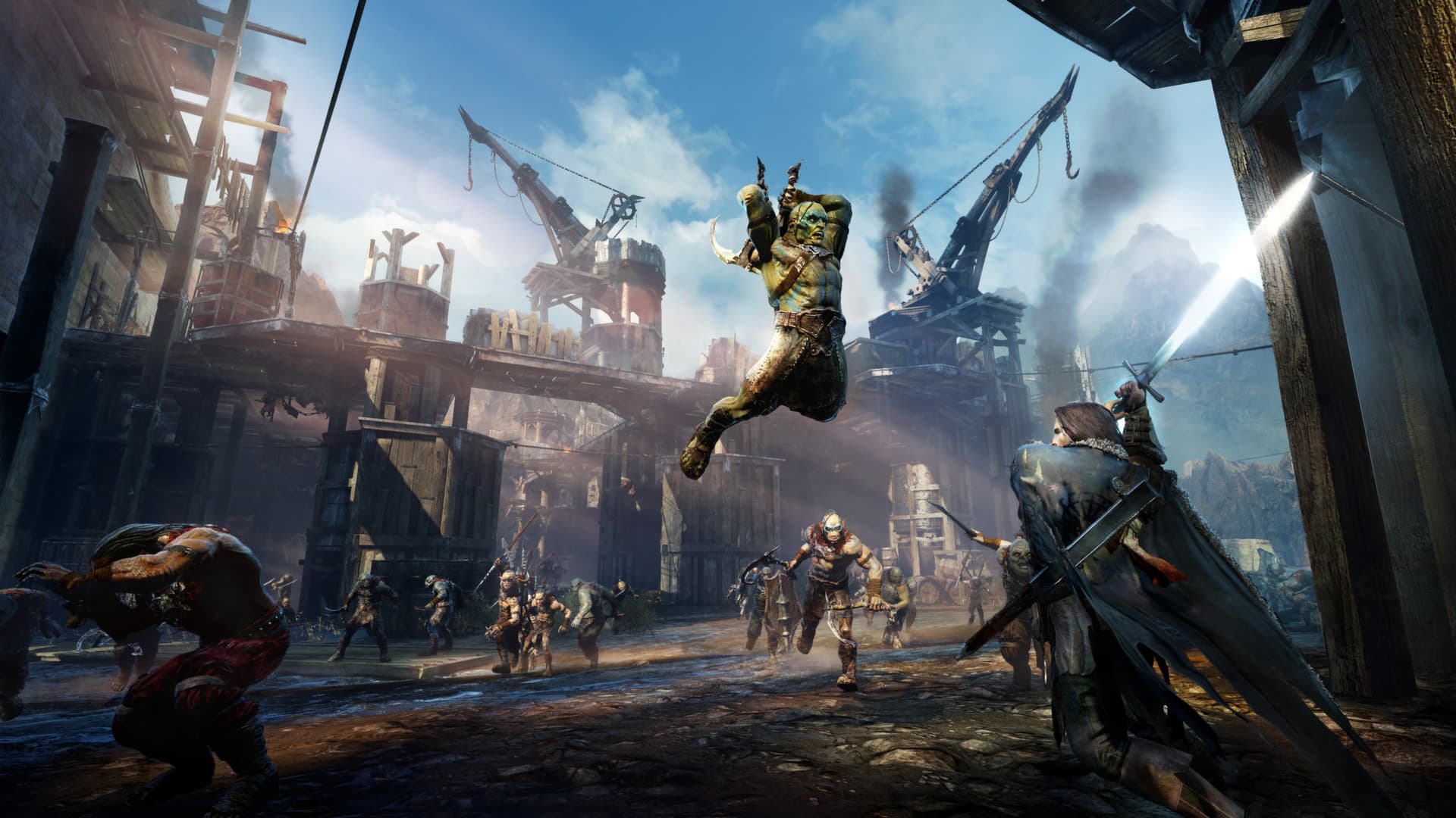 《Middle-earth™: Shadow of Mordor™》游戏画面:一名游侠在废墟城市中迎战敌人。